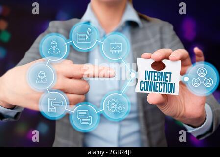 Writing displaying text Internet Connection. Word Written on The way one gains access or connection to the Internet Business Woman Pointing Jigsaw Stock Photo