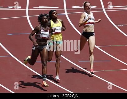 Tokyo, Japan. 02nd Aug, 2021. Canada's Crystal Emmanuel (L) wins a Women's 200m Round one heat ahead of Jamaica's Elaine Thompson-Herah (C) and Belgium's Imke Vervaet at the Athletics competition during the Tokyo Summer Olympics in Tokyo, Japan, on Monday, August 2, 2021. Photo by Bob Strong/UPI. Credit: UPI/Alamy Live News Stock Photo