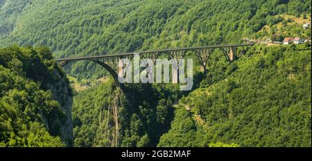 Djurdjevic Tara Bridge over the Tara River near Zabljak town in Montenegro Stock Photo