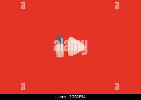 two erasers on a red background. office accessories Stock Photo