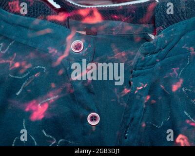 Wearing t shirt texture presented with light rays effect, commercial fabric background. Stock Photo