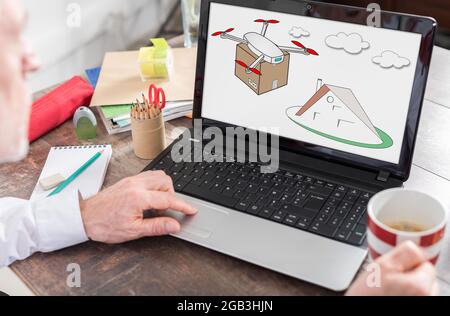 Drone delivery concept shown on a laptop screen Stock Photo