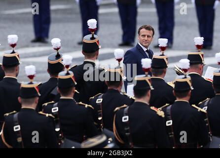 (210802) -- BEIJING, Aug. 2, 2021 (Xinhua) -- French President Emmanuel Macron attends the annual Bastille Day military parade in Paris, France, July 14, 2021. (Xinhua/Gao Jing)