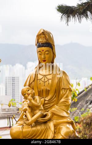 HONG KONG - 10TH APRIL, 2017: Closeup to a buddha at Ten Thousand Buddhas Monastery, located in Sha Tin, Hong Kong Stock Photo