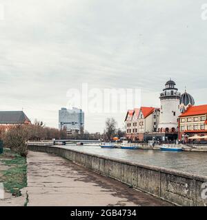 Fish Village, House of Soviets and the Cathedral on the banks of the river Pregolya Stock Photo