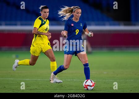 YOKOHAMA, JAPAN - JUNE 15: Chloe Logarzo of Australia and Kosovare Asllani of Sweden during the Tokyo 2020 Olympic Football Tournament Semi Final match between Australia and Sweden at International Stadium Yokohama on June 15, 2015 in Yokohama, Japan (Photo by Pablo Morano/Orange Pictures) Stock Photo