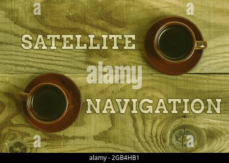 Text sign showing Satellite Navigation. Word for system providing autonomous geospatial positioning Stack of Sample Cube Rectangular Boxes On Surface Stock Photo
