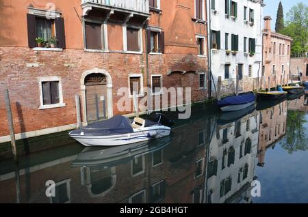 Vedutas of the canals in Venice with the palaces reflected in the waters Stock Photo