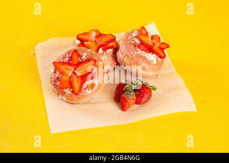 Strawberry pie brioche gourmet doughnuts with custard filling inside Stock Photo