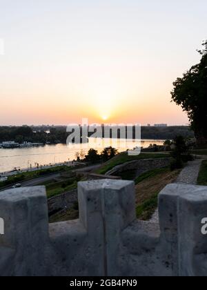 Belgrade, Serbia -  July 27, 2021: Sunset above New Belgrade and Sava river viewed from Kalemegdan fortress in Belgrade, Serbia Stock Photo