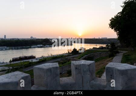 Belgrade, Serbia -  July 27, 2021: Sunset above New Belgrade and Sava river viewed from Kalemegdan fortress in Belgrade, Serbia Stock Photo