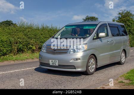 2003 (53) silver Toyota Alphard 2995cc petrol people carrier MPV en-route to Capesthorne Hall classic July car show, Cheshire, UK Stock Photo