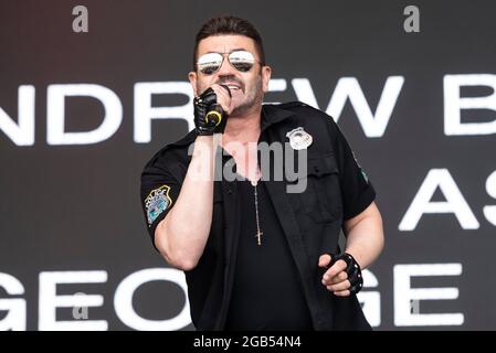 Andrew Browning George Michael tribute act performing at Fantasia music festival in Maldon, Essex, UK. First concert after the COVID 19 pandemic Stock Photo