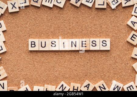 BUSINESS word written on wood block. BUSINESS text on wooden table. Business Concept Stock Photo