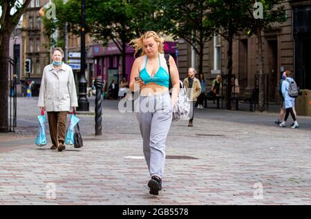 Dundee, Tayside, Scotland, UK. 2nd Aug, 2021. UK Weather: A cool windy day with occasional sunny spells across North East Scotland with temperatures reaching 14°C. Bank Holiday Monday sees only a few people out in Dundee city centre socialising whilst shopping. Credit: Dundee Photographics/17�Թ����� Live News Stock Photo