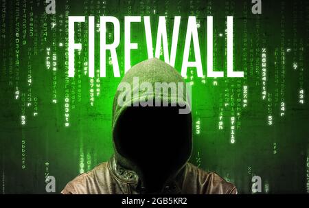 Faceless hacker with inscription Stock Photo