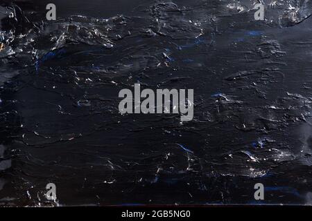 old black painted wall curves. Abstract colorful cement wall texture and background, Dark color Stock Photo