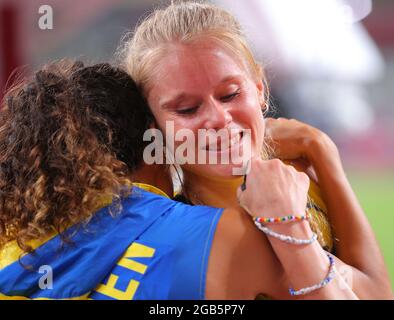 Tokyo, Japan. 2nd Aug, 2021. Angelica Bengtsson (L) and Michaela Meijer of Sweden hug each other after the women's pole vault qualification at Tokyo 2020 Olympic Games, in Tokyo, Japan, Aug. 2, 2021. Credit: Li Ming/Xinhua/Alamy Live News Stock Photo