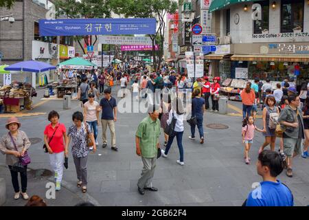 Seoul, South Korea - 1 June 2014, Asian Tourist and local Korean people enjoy walking and shopping around in the shopping street, Seoul, South Korea. Stock Photo