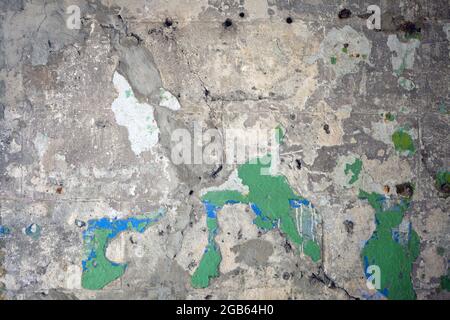 old damaged wall with concrete and paint. Grunge wall of thehouse. Textured background Stock Photo