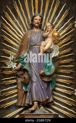 VIENNA, AUSTIRA - JUNI 17, 2021: The  St. Joseph carved statue in baroque church  Alserkirche. Stock Photo