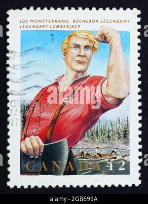CANADA - CIRCA 1992: a stamp printed in the Canada shows Jos Monferrand, Lumberjack, Legendary Hero, circa 1992 Stock Photo