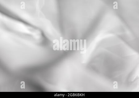 Gray Abstract background. Soft and smooth blurred background. Defocused tulle fabric photography Stock Photo