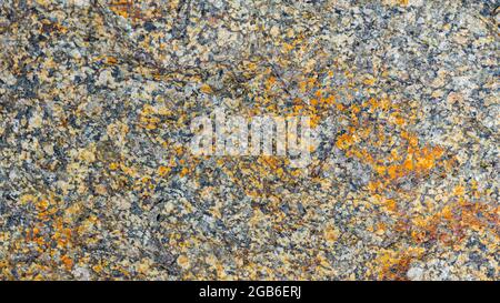 Texture of the rocky surface. Granite texture as nature background. Natural gray granite with a grainy pattern Stock Photo