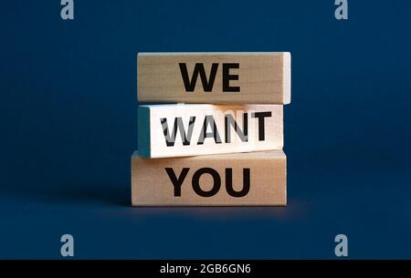 We want you symbol. Wooden blocks with words 'We want you' on beautiful grey background. Business, hiring and we want you concept. Stock Photo