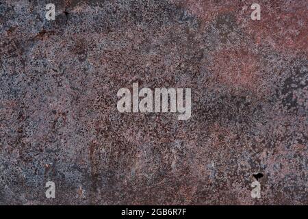 Rusty iron sheet with two little holes Stock Photo