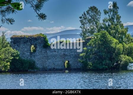 Loch an Eilein Castle in Loch an Eilein, near Rothiemurchus, Aviemore, Badenoch and Speyside, Scotland Stock Photo