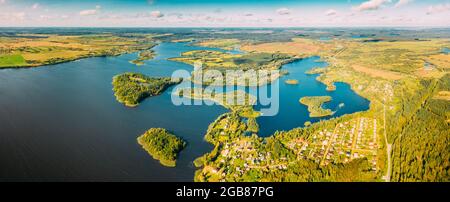 Lyepyel District, Lepel Lake, Beloozerny District, Vitebsk Region. Aerial View Of Residential Area With Houses In Countryside. Top View Of Island Stock Photo