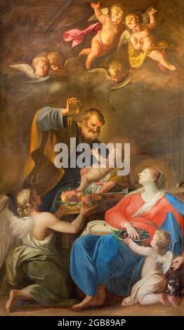 VIENNA, AUSTIRA - JULI 5, 2021: The painting of Holy Family in the church Jeusitenkirche by Andrea Pozzo from begin of 18. cent. Stock Photo