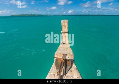 Traditional wood carved boat in the Aitutaki lagoon, Rarotonga and the Cook islands Stock Photo