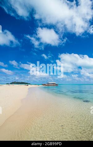 Traditional wood carved boat in the Aitutaki lagoon, Rarotonga and the Cook islands Stock Photo