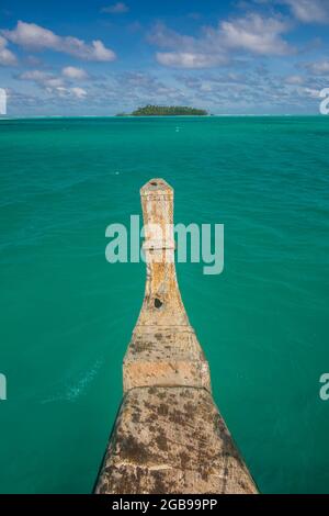 Traditional wood carved boat in the Aitutaki lagoon, Rarotonga and the Cook islands Stock Photo