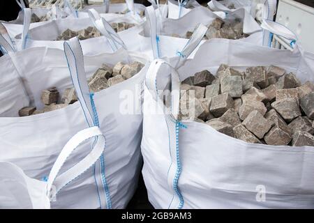 Big Bag, large plastic bags filled with paving stones, Berlin, Germany Stock Photo