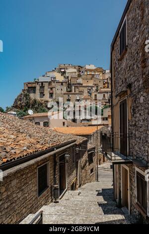 Caccamo,Sicily,Italy.View of popular hilltop medieval town with colorful and stone houses.Medieval village with famous impressive Norman castle.Pictur Stock Photo