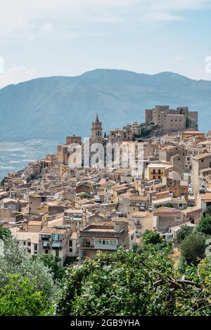 Caccamo, Sicily, Italy. View of popular hilltop medieval town with impressive Norman castle and surrounding countryside.Italian landscape.Picturesque Stock Photo