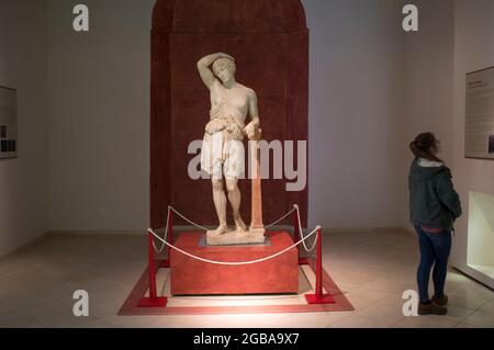 Ecija, Spain - April 21th, 2019: Visitor young woman at Ecija Municipal Museum of History, Seville, Spain Stock Photo