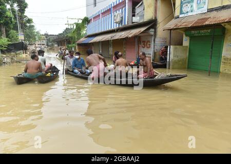 People use boat to commute in the Ghatal area of Paschim Medinipur ...