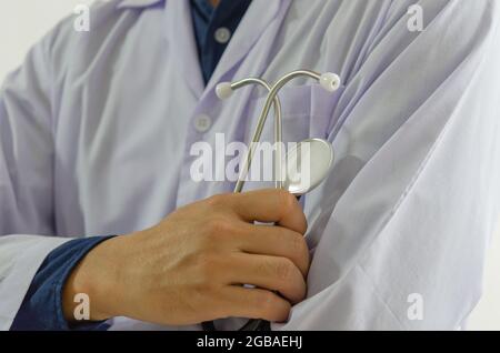 close up of the doctor hand holding a medical stethoscope Stock Photo