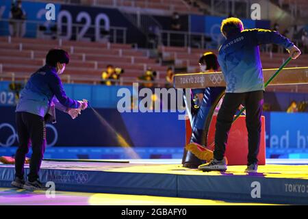 Tokyo, Japan. 03rd Aug, 2021. Workers sanitize the balance beam before the start of the women's individual apparatus artistic gymnastics final at the Ariake Gymnastics Centre at the Tokyo Olympic Games in Tokyo, Japan, on Tuesday, August 3, 2021. Photo by Richard Ellis/UPI Credit: UPI/Alamy Live News Stock Photo