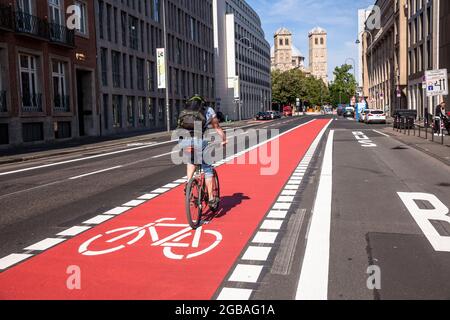 widened cycle track on the Gereon street, St. Gereon church, Cologne, Germany.  verbreiterter Radweg auf der Gereonstrasse, St. Gereon Kirche, Koeln, Stock Photo