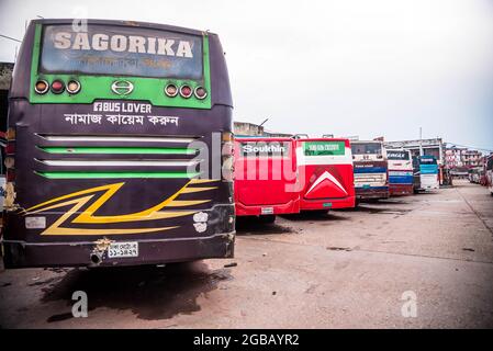 Barishal, Bangladesh. 03rd Aug, 2021. BARISHAL, BANGLADESH - AUGUST 2: Aerial view taked with a drone, of buses line up at the Barishal Bus Stand, one of the busiest bus-stand in the south region in Bangladesh, amid lockdown week in Bangladesh as attempt to stop the spread of Covid-19. on August 2, 2021 in Barishal, Bangladesh. (Photo by Eyepix/Sipa USA) Credit: Sipa USA/Alamy Live News Stock Photo