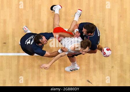 Tokyo. 3rd Aug, 2021. Mathias Gidsel of Denmark (C) shoots during the handball men's quarterfinal between Denmark and Norway at Tokyo 2020 Olympic Games in Tokyo, Japan on Aug. 3, 2021. Credit: Chen Yichen/Xinhua/Alamy Live News Stock Photo