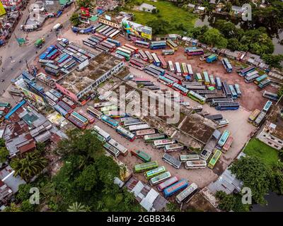 Aerial view taked with a drone, of buses line up at the Barishal Bus Stand, one of the busiest bus-stand in the south region in Bangladesh, amid lockdown week in Bangladesh as attempt to stop the spread of Covid-19. on August 2, 2021 in Barishal, Bangladesh. Photo by Mustasinur Rahman Alvi/Eyevix/ABACAPRESS.COM Stock Photo