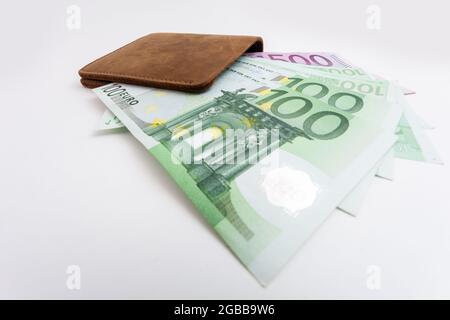 wallet with euro sticking out of it Stock Photo