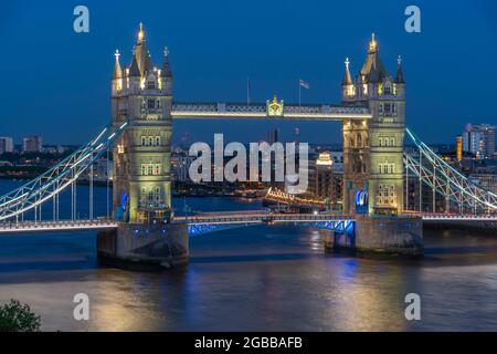 View of Tower Bridge from Cheval Three Quays at dusk, London, England, United Kingdom, Europe Stock Photo