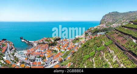 Cultivated terraced fields on hills above the coastal town Camara de Lobos, Madeira island, Portugal, Atlantic, Europe Stock Photo